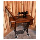 Singer treadle sewing machine #AL237342, with acce