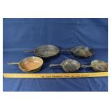 5 cast iron skillets: largest 10-1/2"; as is