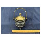 Footed cast iron and brass smudge pot; as is