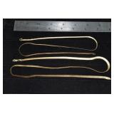 Two 14 kt gold herringbone necklaces: 24" and 20",