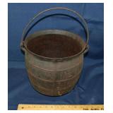 Antique cast iron stew pot with bale handle, crack