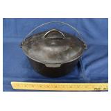 MacDonald #8 cast iron Dutch oven with lid and bal
