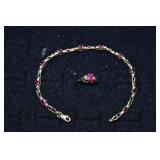 10 kt gold ring & bracelet: ring set with diamonds
