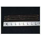 Marked 14 kt gold jewelry: three 18" necklaces 8gt