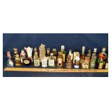 27 assorted liquor/cordial bottles; as is
