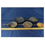 5 cast iron skillets: largest 10-1/2", one is dama