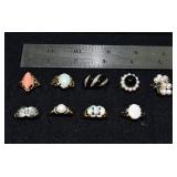 Marked 14 kt gold jewelry: 9 rings set with diamon