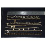 Marked 14 kt gold jewelry: 7 bracelets some with c