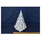 White ceramic HM Co illuminated Christmas tree wit