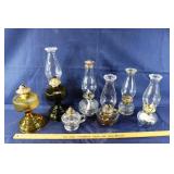 7 glass oil lamps; as is