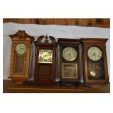 4 wall clocks; as is