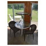 2 wicker style patio arm chairs, 2 circular glass