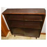Wood finish and glass sliding door book case, 36x1