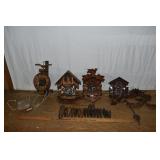 3 cuckoo clocks and wooden works stone weight wall