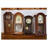 4 wall clocks; as is