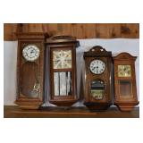 4 wall clocks; as is