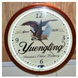 Yuengling working neon wall clock, 19" diameter; a