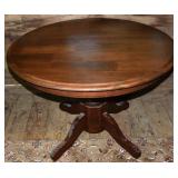Walnut finish round pedestal table, 42"x20"h; as i