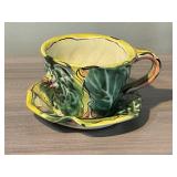 LARGE POTTERY COFFEE CUP AND SAUCER WITH RABBIT