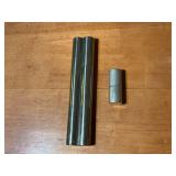 2 HOLDERS SHAPED LIKE TUBES