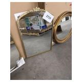 Gold framed wall mirror31inx21in