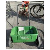 Grass seeder-spreader-used-outside
