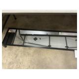 Full length black framed mirror