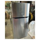 LG  Stainless Steel refrigerator -has some marks