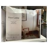 Threshold floor lamp