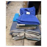 3- Stacks of used moving pads