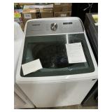 Samsung washer -small dents bottom front