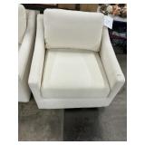 MCM cream swivel chair