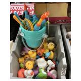 Gray bin of rubber ducks lor & kids fishing game