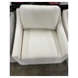 MCM cream swivel chair