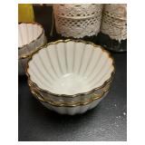 2- Small gold trimmed bowls decor