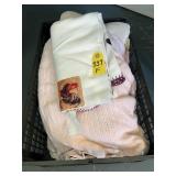Crate Of Blankets And Throws