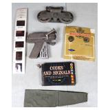 Pulley,cap gun,codes and signals book