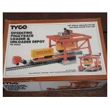 Tyco Operating Piggyback Loader and Unloader