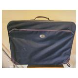 American Tourist er Rolling Suitcase