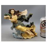 Angel Sculpture has Broken Wing