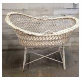 LARGE WICKER BABY BASSINET- HAS CHIP ON ONE LEG LARGE WICKER BABY BASSINET- HAS CHIP ON ONE LEG