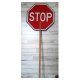 Plastic Stop Sign and Slow Sign Double-Sided on a Plastic Stop Sign and Slow Sign Double-Sided on a