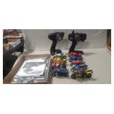 (2) Radio Controllers w/ Assorted Paperwork & (9)