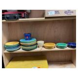 Shelf Lot Of Fiesta Plates, Bowls, Cups