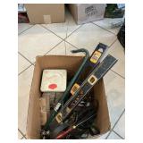 Box Lot With Levels, Pry Bar, Drill Sharpener,