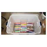 (34) Assorted VHS Tapes w/ A Plastic Storage