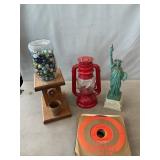 Gumball Dispenser With Marbles, Lantern, Statue