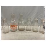 (6) Assorted Milk Bottles