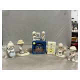 Precious Moments Snowglobe, Figures