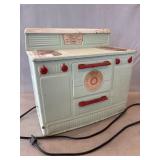 Little Lady (Toy) Bakes Like Mother